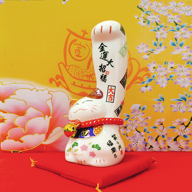 Mèo thần tài tay lớn