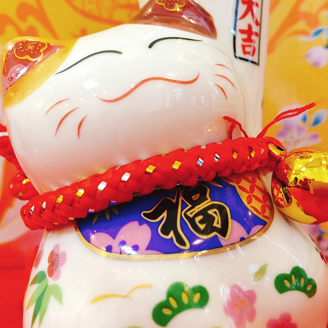 Mèo thần tài tay lớn