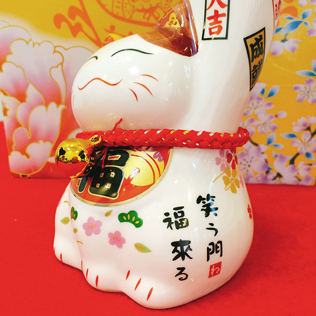 Mèo thần tài tay lớn