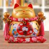 Mèo thần tài vàng Buôn May Bán Đắt