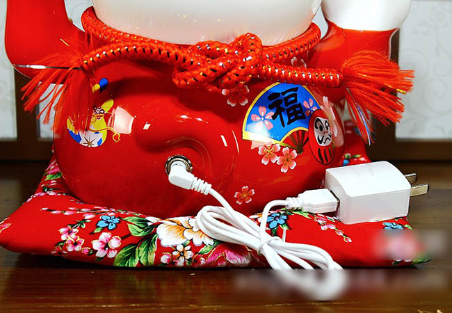 Mèo vẫy tay kim vận chiêu tài
