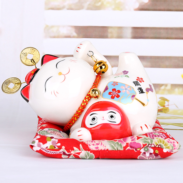 Mèo thần tài dáng nằm niên niên hữu dư 